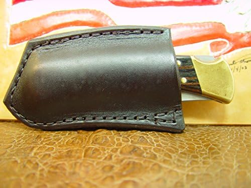 Custom left hand crossdraw Leather Knife Sheath for the buck 110 OR 112 knife.