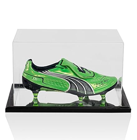 green puma football boots