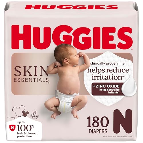 Huggies Size Newborn Diapers, Skin Essentials Baby Diapers, Size Newborn (6-9 lbs), 180 Count (3 Packs of 60), Packaging May Vary