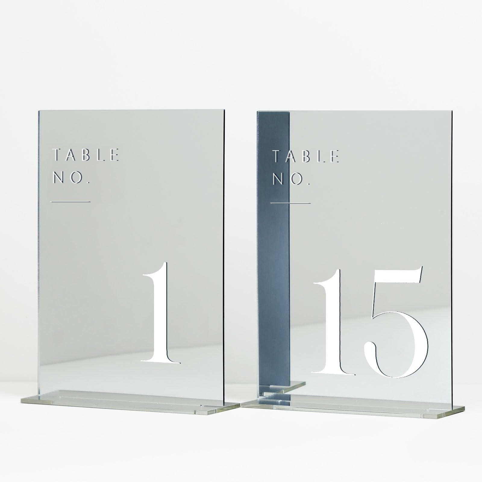 Photo 1 of JINMURY Sliver Wedding Table Numbers 1-15 with Stands, 5"x7" Sliver Mirror Acrylic Table Numbers for Wedding Reception (Sliver Mirror White Font, Number 1-15, 5"x7")