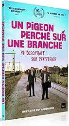 Un Pigeon Perché Sur Une Branche Philosophait Sur L'existence