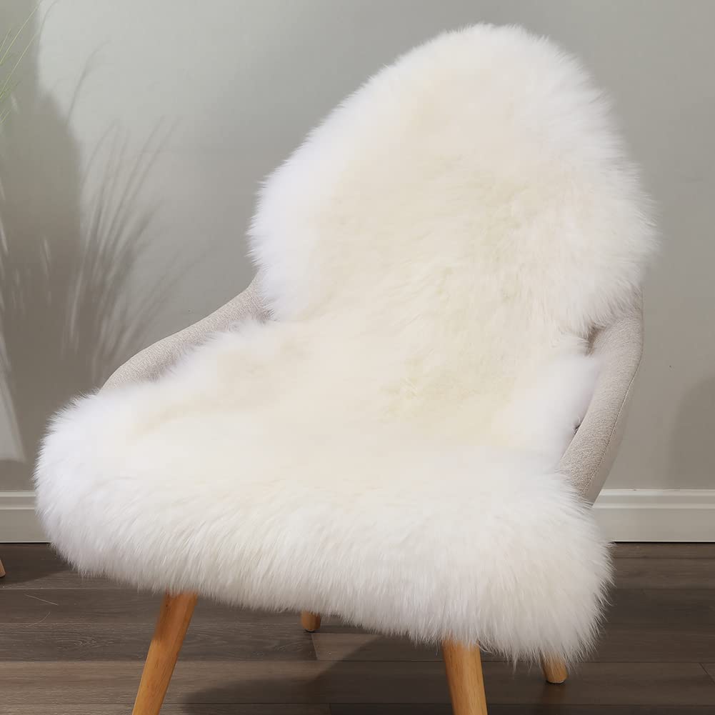 Photo 1 of LLB Genuine Sheepskin Area Rug Wool Rug Fur Carpet Fluffy Shaggy Fur Rug for Living Room Kids Bedroom Real Sheepskin Throw Lambskin Rugs Sofa Mat Chair Seat Covers (Ivory White, 2 x 3 ft Sheepskin)