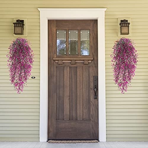 Hanging artificial vine plant in plastic container for decor.