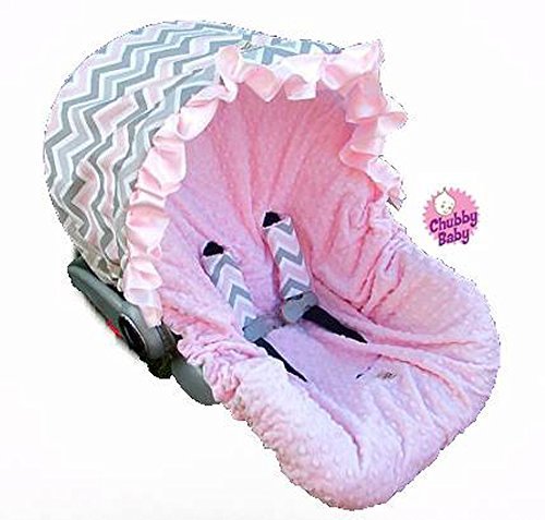 Baby Car Seat Cover, Canopy in pink, grey, and white Chevron. Seat in
baby pink minky. FREE strap covers included Baby Car Seat Cover, Canopy in pink, grey, and white Chevron. Seat in
baby pink minky. FREE strap covers included