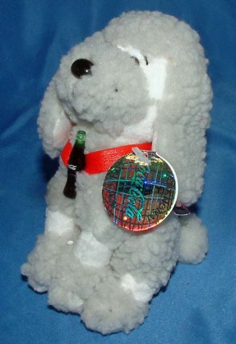 Coca Cola Strudel the French Poodle Beanie with French Flag Tag holding a tiny Coke Bottle.