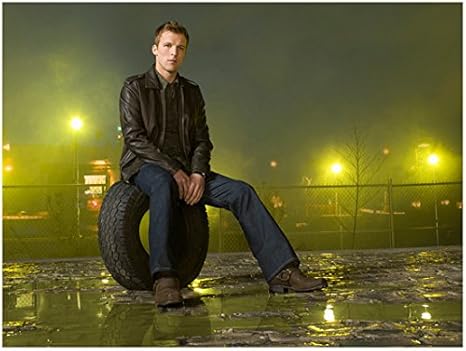 dark green shirt with black jeans