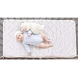 crib sheet protector with snaps