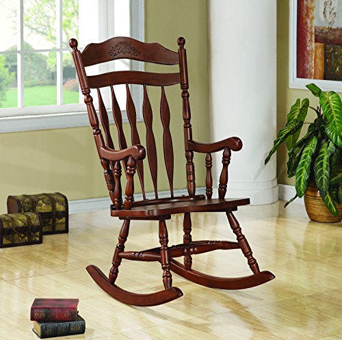 Coaster rocking chair with carved detail in medium brow…