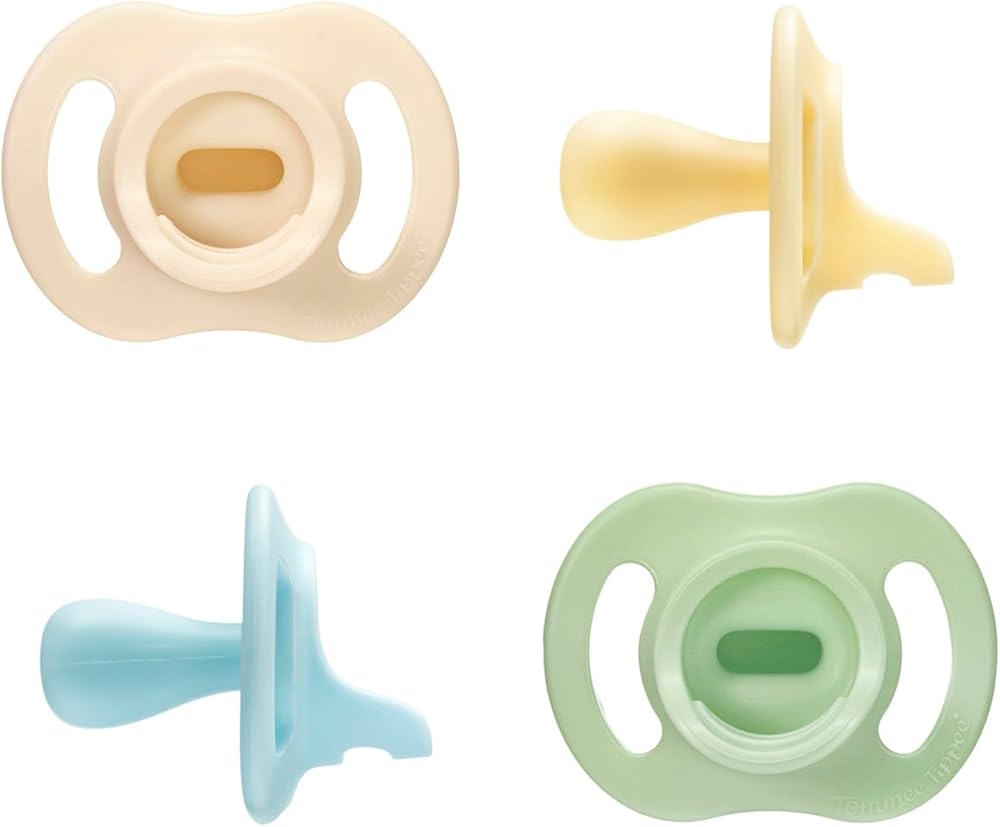 Tommee Tippee Ultra-Light StayPut Pacifier, 0-6 Months, Pack of 4 | One-Piece Silicone Design, Stays Put in Baby's Mouth, BPA