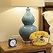 Pluteck Non Ticking Travel Alarm Clock with light and Snooze/Ascending Sound Alarm/Simple to Set Clocks, Battery Powered, Small, Black