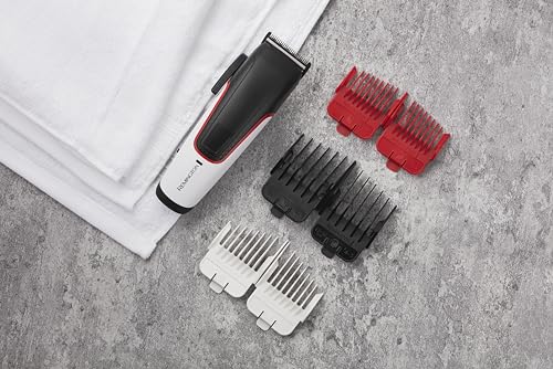 Remington Haarschneidemaschine [selbstschärf. Edelstahl Klingen/10 angeschrägte Fade-Kämme/0,8-25mm] Haarschneider Set (inkl. 9 normale Aufsteckkämme, Netz-/Akkubetrieb, Tasche) HC500 10