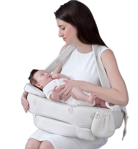 baby holding cushion