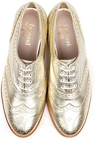 gold brogues