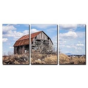Old Abandoned Rusty Old Barn in The Middle...