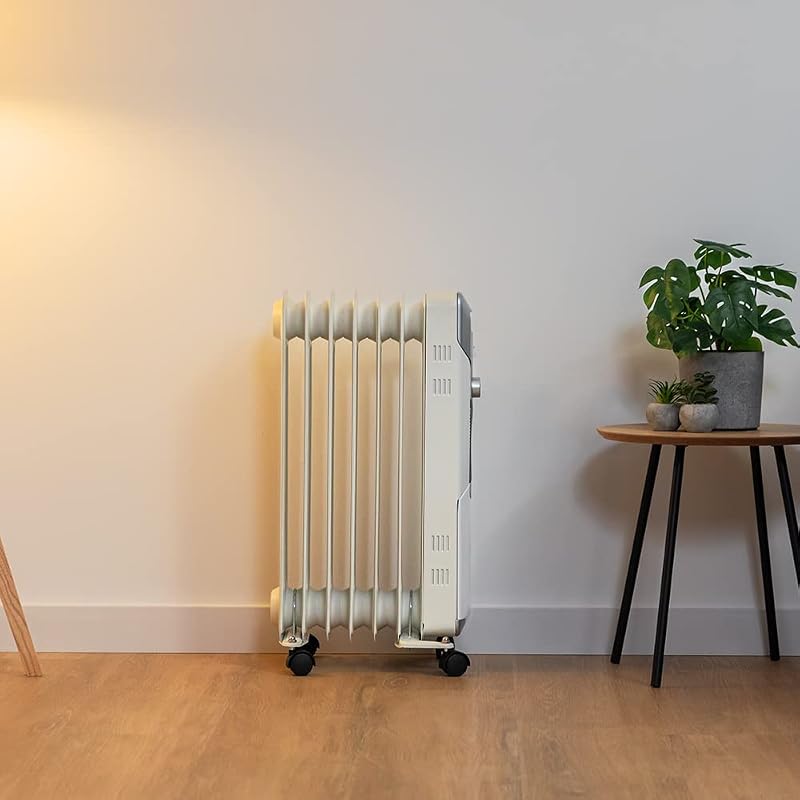 Radiatore elettrico ad olio ReadyWarm 7000 Space. 7 moduli, basso consumo energetico, 1500 W, 3 Livelli, Raccoglitore di Cavi, Sistema di Sicurezza, Ruote, 15 m2