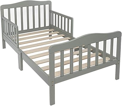 white wooden toddler bed