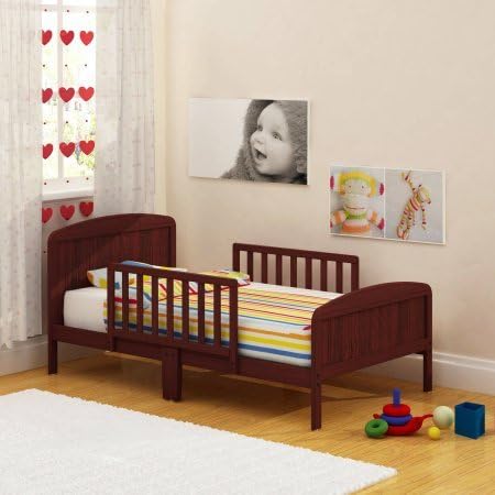 Wooden Toddler Bed, Multiple Colors. Guardrail toddler bed includes 2 center mount guard rails & Unique center mount XL guardrails put the protection in the center. BONUS FREE E-Book (Classic Cherry)