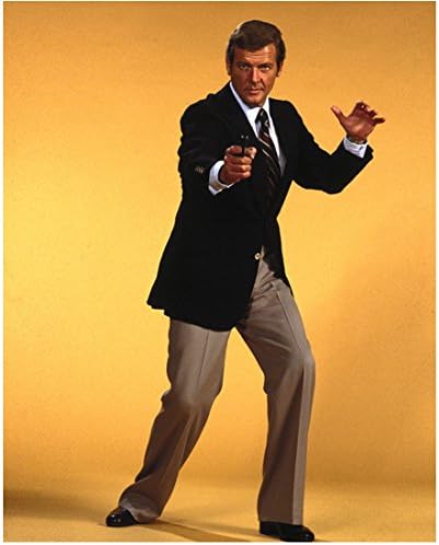 Roger Moore As James Bond 007 Classic Pose Aiming Gun 8 X 10 Inch Photo At Amazon S Entertainment Collectibles Store
