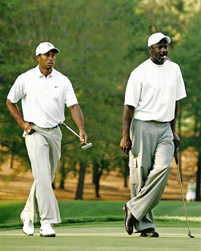 Sports icons Tiger Woods and Michael Jordan playing a round of - 11"x14" Photo, Mounted in 16"x20" Double Matt and Framed with Plexi Glass
