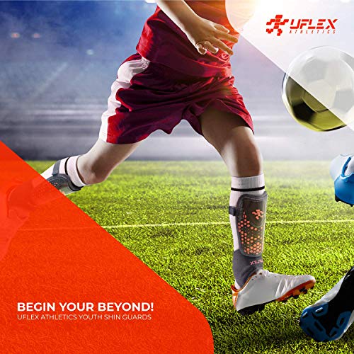 UFlex Athletics Slip and Slide Shin Guards for Kids and Teens - Protective Soccer Gear for Boys and Girls with Padded Ankle Support - Non Slip Adjustable Straps (Medium)