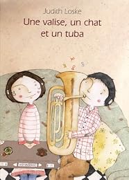 Une  valise, un chat et un tuba