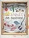 Une année en cuisine : 100 produits à cuisiner au fil des saisons by 