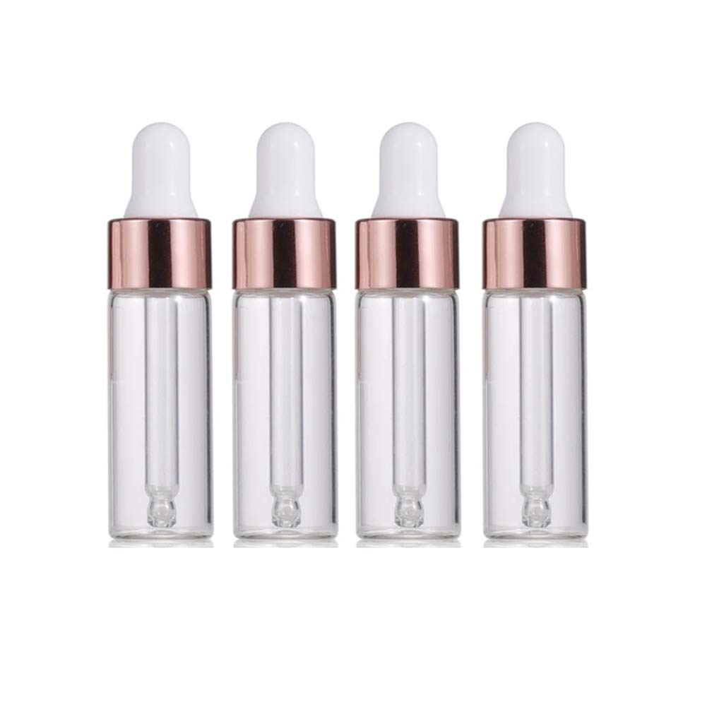Photo 1 of 30 Clear Glass Dropper Bottles Essential Oil Sample Perfume Vials Liquid Cosmetic Containers Glass Eye Dropper Bottles With Rose Gold Lids (5ml)