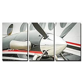 Relection of a Runway on a Propeller Engined...