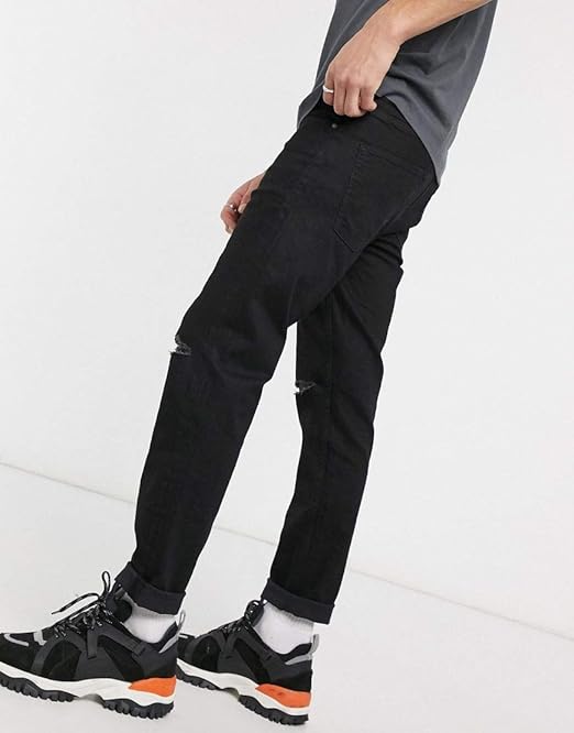washed black tapered jeans