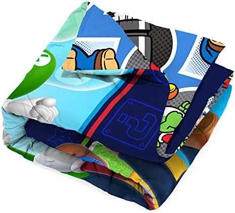 Super Mario themed comforter on a bed in a bedroom.