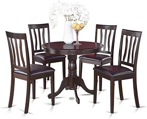 Wooden dining table set with chairs, suitable for a dining room setting.