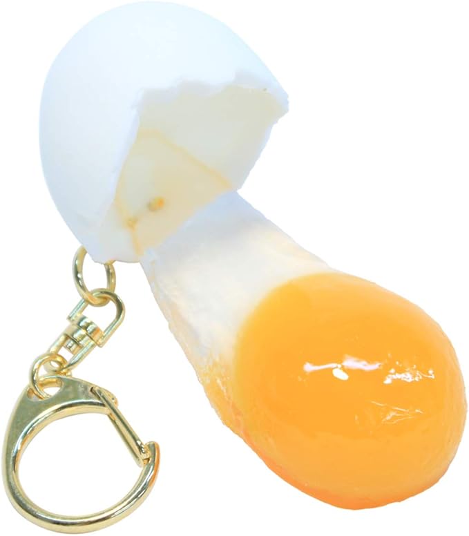 Amazon Co Jp 食品サンプル キーホルダー 生卵 面白さに誰もがトリコ この瞬間が食品サンプルに おもしろ雑貨 ホーム キッチン