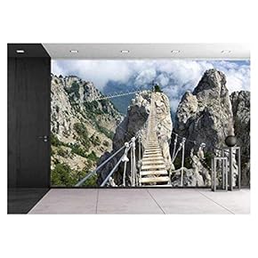 Hanging Bridge in Steep Rocks with Going Man. Ai-Petri, Crimea - Removable Wall Mural | Self-Adhesive Large Wallpaper - 66x96 inches