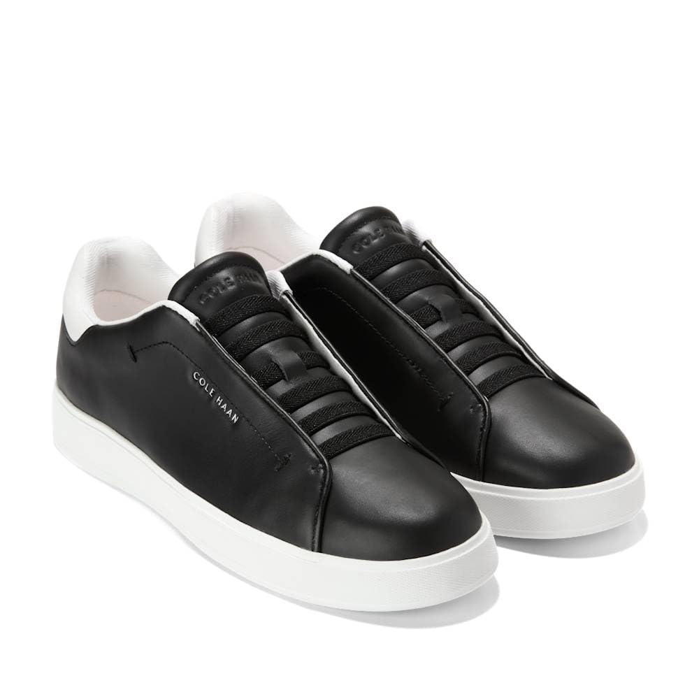 Cole Haan Women’s Shoes – Grandpro Luxe Slip-On Sneaker, Black/Black Leather, 5.5-B US