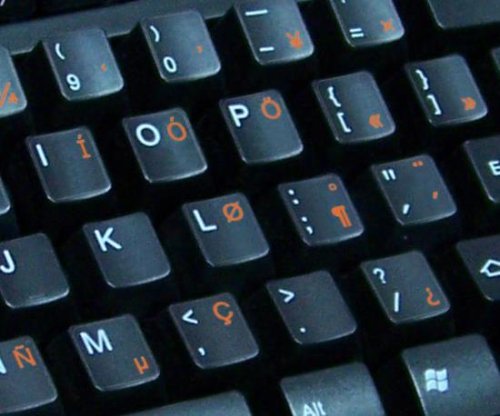 ENGLISH US INTERNATIONAL KEYBOARD STICKERS WITH ORANGE LETTERING ON TRANSPARENT BACKGROUND