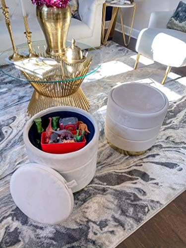 A gray ottoman with a luxurious and inviting texture, suitable for seating in a living area.