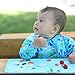 green sprouts Easy-wear Long Sleeve Bib | Full, waterproof protection from mealtime to playtime | Flip-pocket easily catches stray food, Soft & comfortable material, Available in 12-24 mo & 2T-4T