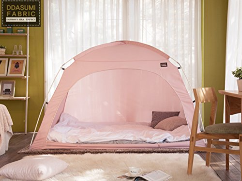 tent with bed inside