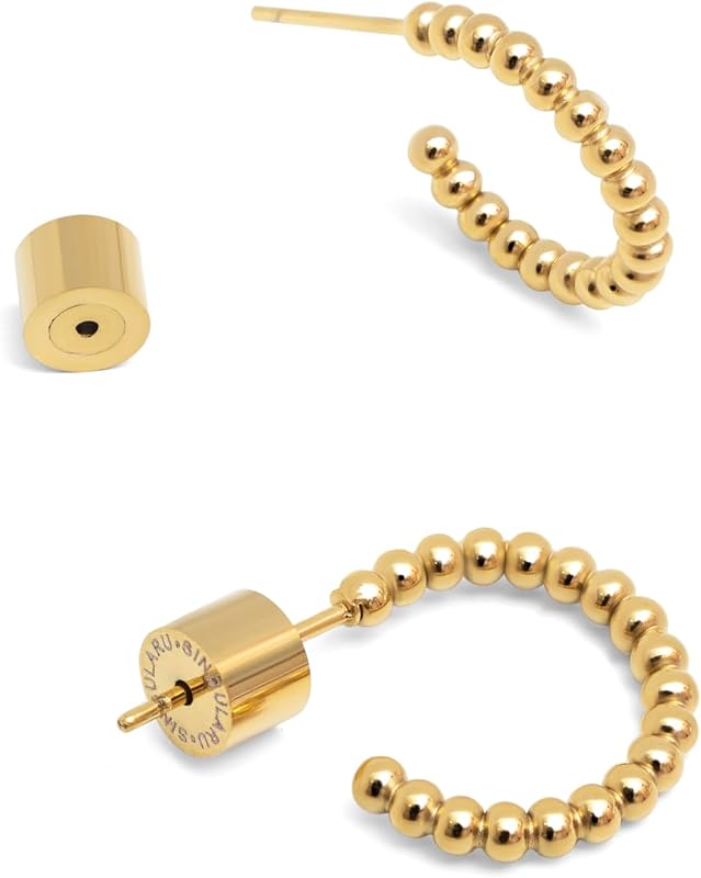 - Boucles d'oreilles Pebble Dots S. Acier avec finition plaqué or 18 kt. Fermoir en silicone plaqué. Bijoux pour femme