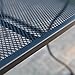Belham Living Stanton 42 x 72 in. Oval Wrought Iron Patio Dining Table by Woodard - Textured Black