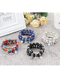 Finrezio - Juego de 4 pulseras de cuentas para mujer, elásticas, apilables, diseño de alas elefantes, multicolor