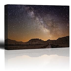 Road Leading to The Mountains with a Starry...