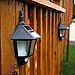 Motion Sensor Wall Lights - Outdoor Solar Security Black Sconces, Waterproof, White LEDs - 2 Pack
