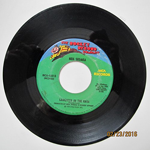Laughter In The Rain/Endlessly (7″/45 rpm)