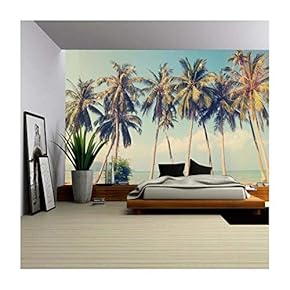 Vintage tropical palm trees on a beach