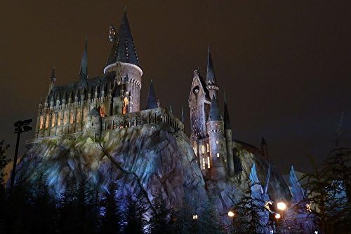 Hogwarts castle rocks colorful towers - Print on Canvas (20x13inch: Unframed)