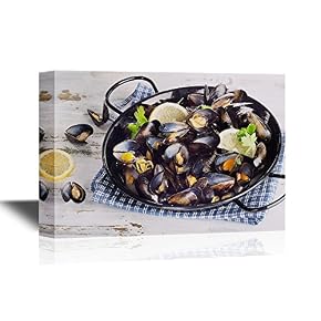 Seafood Copper Pot of Mussels Garnished with Lemon Slices
