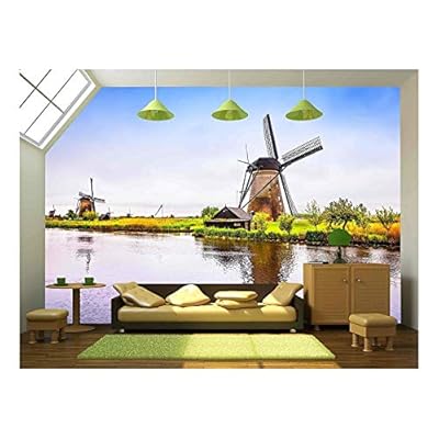 Windmills and Water Canal in Kinderdijk, Holland or Netherlands. - Removable Wall Mural | Self-Adhesive Large Wallpaper - 100x144 inches