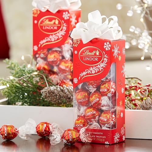 LINDT LINDOR MILK CHOCOLATE CANDY TRUFFLES TRADITIONS GIFT BOX, MILK CHOCOLATE CANDY WITH SMOOTH, MELTING TRUFFLE CENTER, 6.8 OZ.