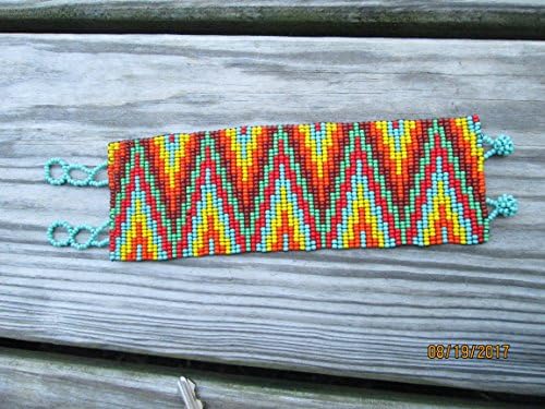 rainbow zig zag wide flart bracelet hand beaded southwest native american design fair trade beadwork seed beads orange red green .ethnic